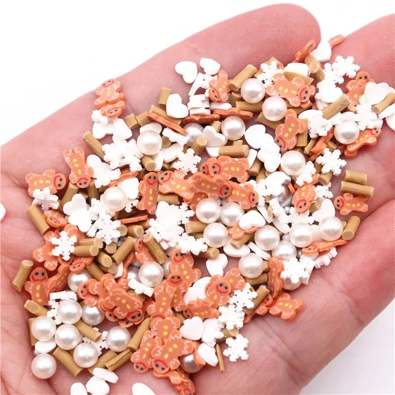 A handful of polymer clay slices in orange, white, and natural wood tones for DIY crafts.