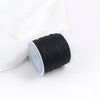 A roll of black 0.8mm cotton nylon macrame cord for jewelry making and crafts.