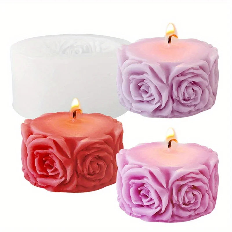 Three silicone rose candle molds in shades of pink and red are displayed against a white background.