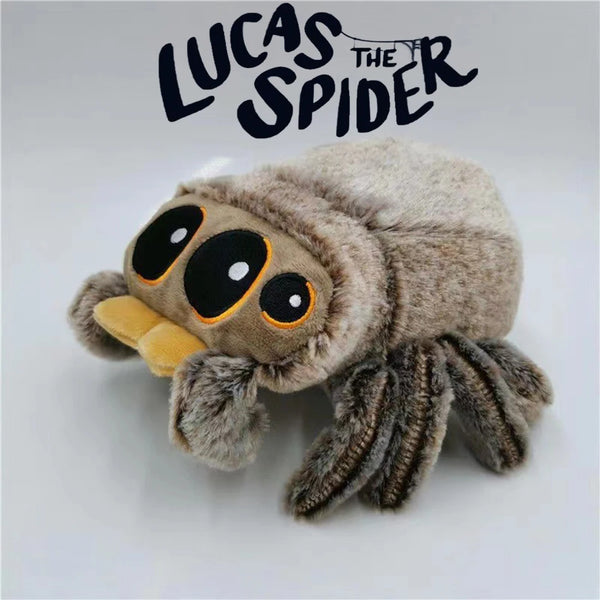 A plush toy of Lucas the Spider with brown fur and large black eyes.