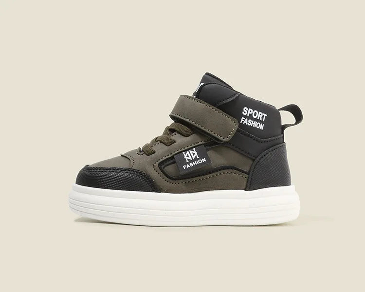 A pair of dark olive green and black kids' high-top sneakers with a white sole.