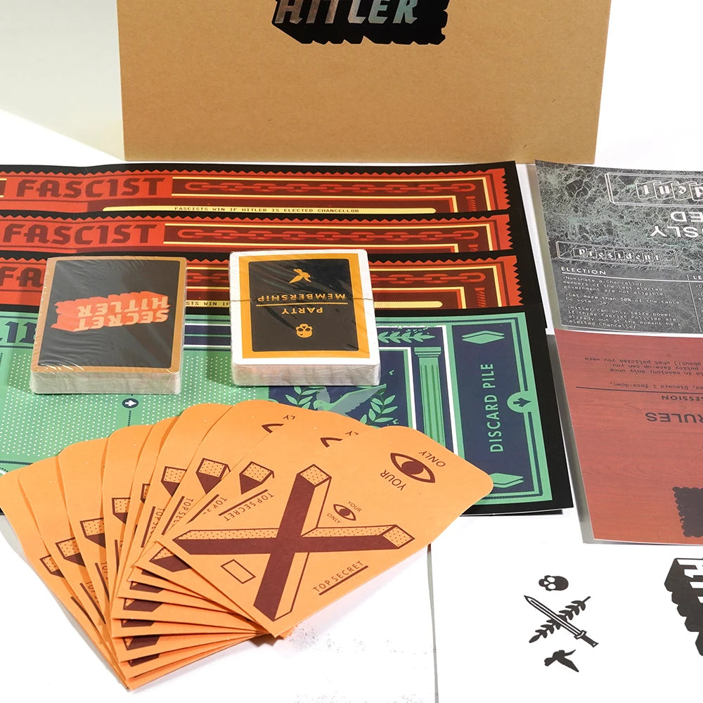A collection of orange playing cards and game components are displayed next to a brown box featuring the title HITLER.