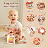 A baby is playing with a wooden mushroom castle stacking toy and various sensory toys like rings, beads, and mirrors.
