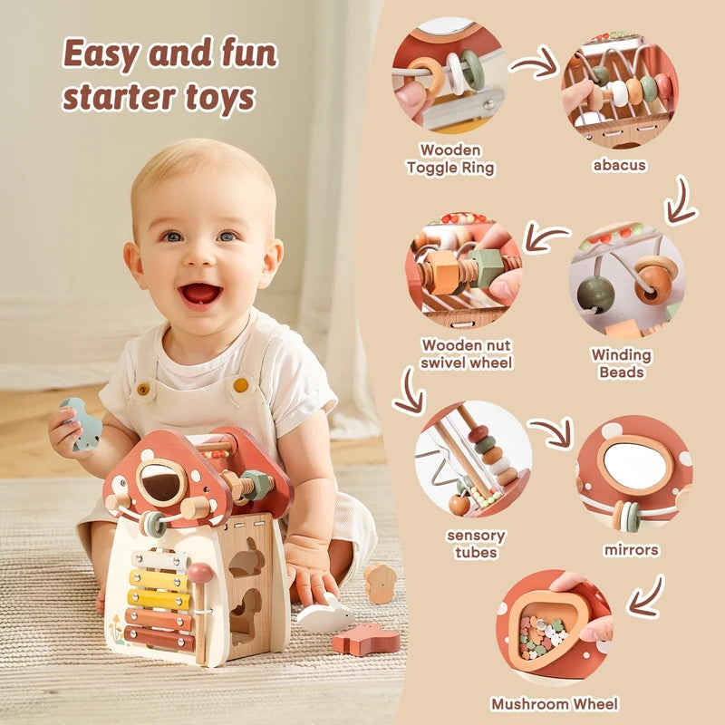 A baby is playing with a wooden mushroom castle stacking toy and various sensory toys like rings, beads, and mirrors.