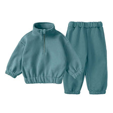 A teal fleece hooded tracksuit set for a child, consisting of a zip-up top and matching pants.