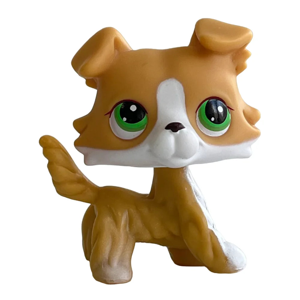 A small, tan and white Bobbing Deer bobblehead toy with large green glow eyes.