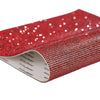 Red sparkling rhinestone adhesive tape rolled up for DIY crafts and decor