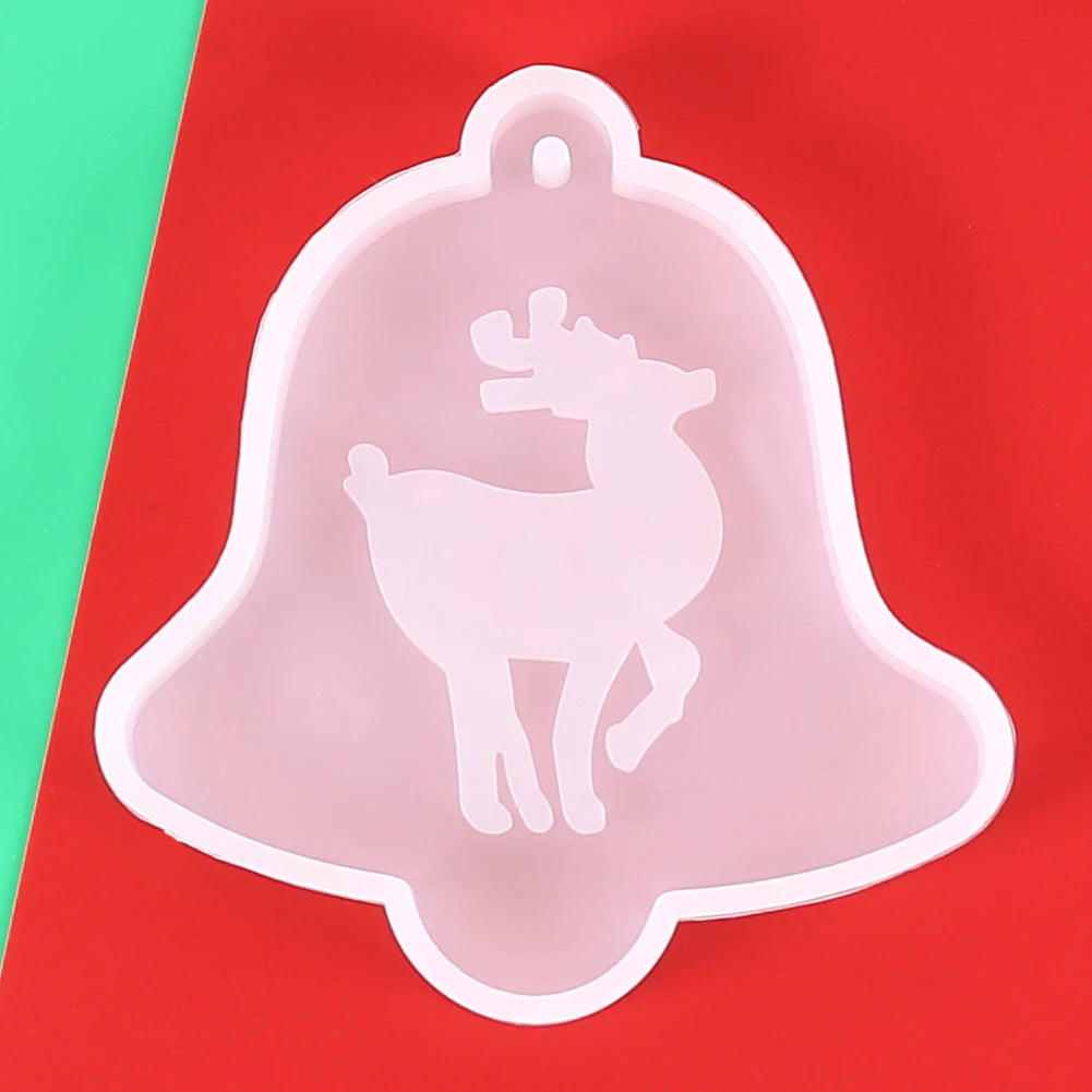 A clear silicone mold shaped like a deer silhouette is displayed on a red background.