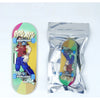 A silver foil packet containing a finger skateboard with a colorful graphic design.