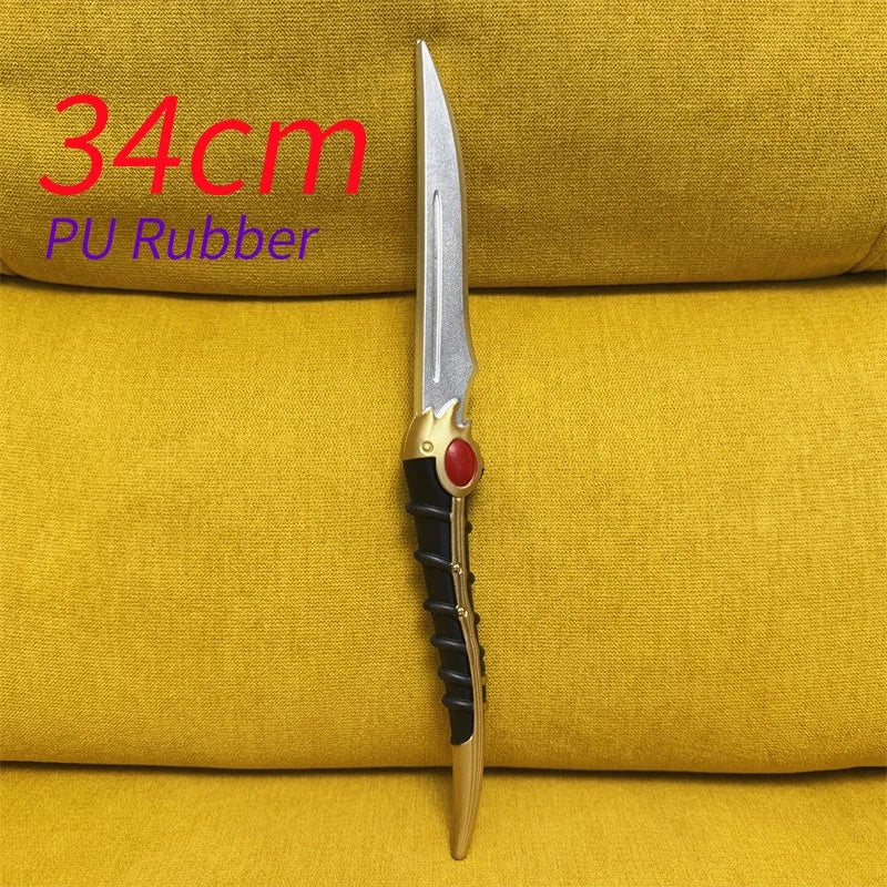 A silver PU rubber dagger with a black handle and red accent is displayed on a yellow fabric background.