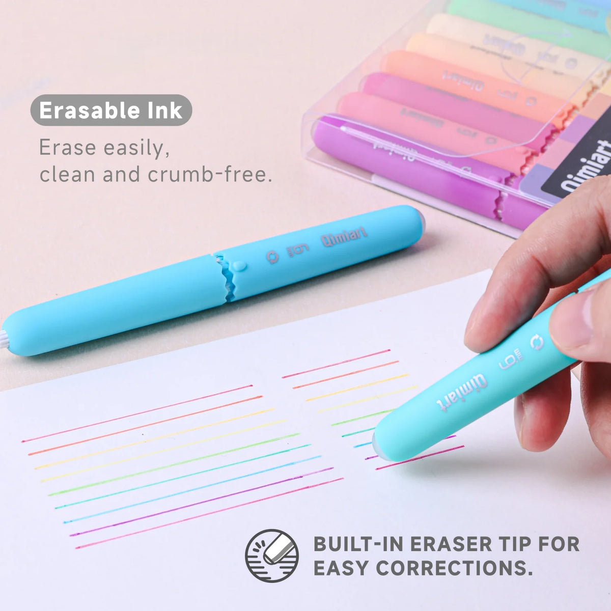A hand holds a light blue erasable ink pen with an eraser tip, demonstrating easy corrections on paper.