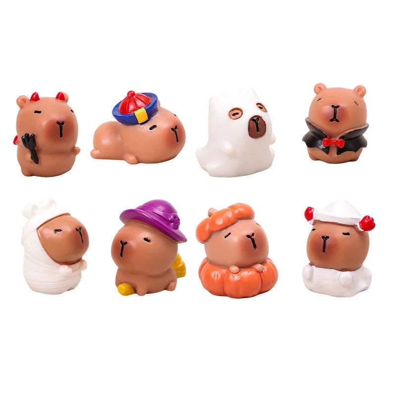 Colección de nueve figuras de animales de cerámica, como osos, conejos y fantasmas, en varios colores y accesorios.