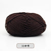 A ball of dark brown pre-dyed milk cotton yarn used for knitting and crochet.
