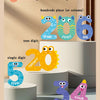 A set of magnetic number recognition puzzles showing multi-digit numbers like 206 and single digits such as 5, 20, and 34.