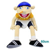 A realistic plush hand puppet resembling a character with blue hair and yellow clothing standing on its feet.