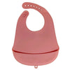 A pink waterproof silicone baby bib with a catch pocket.