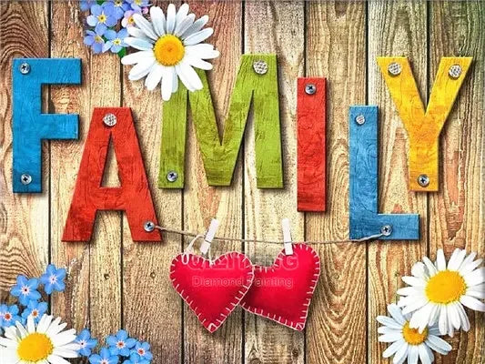 Colorful wooden letters spelling FAMILY with floral designs and blue flowers