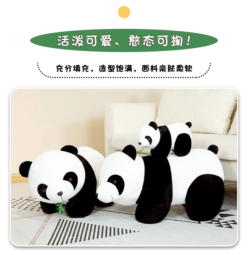 A white and black panda plush stuffed animal sitting on a light-colored surface.