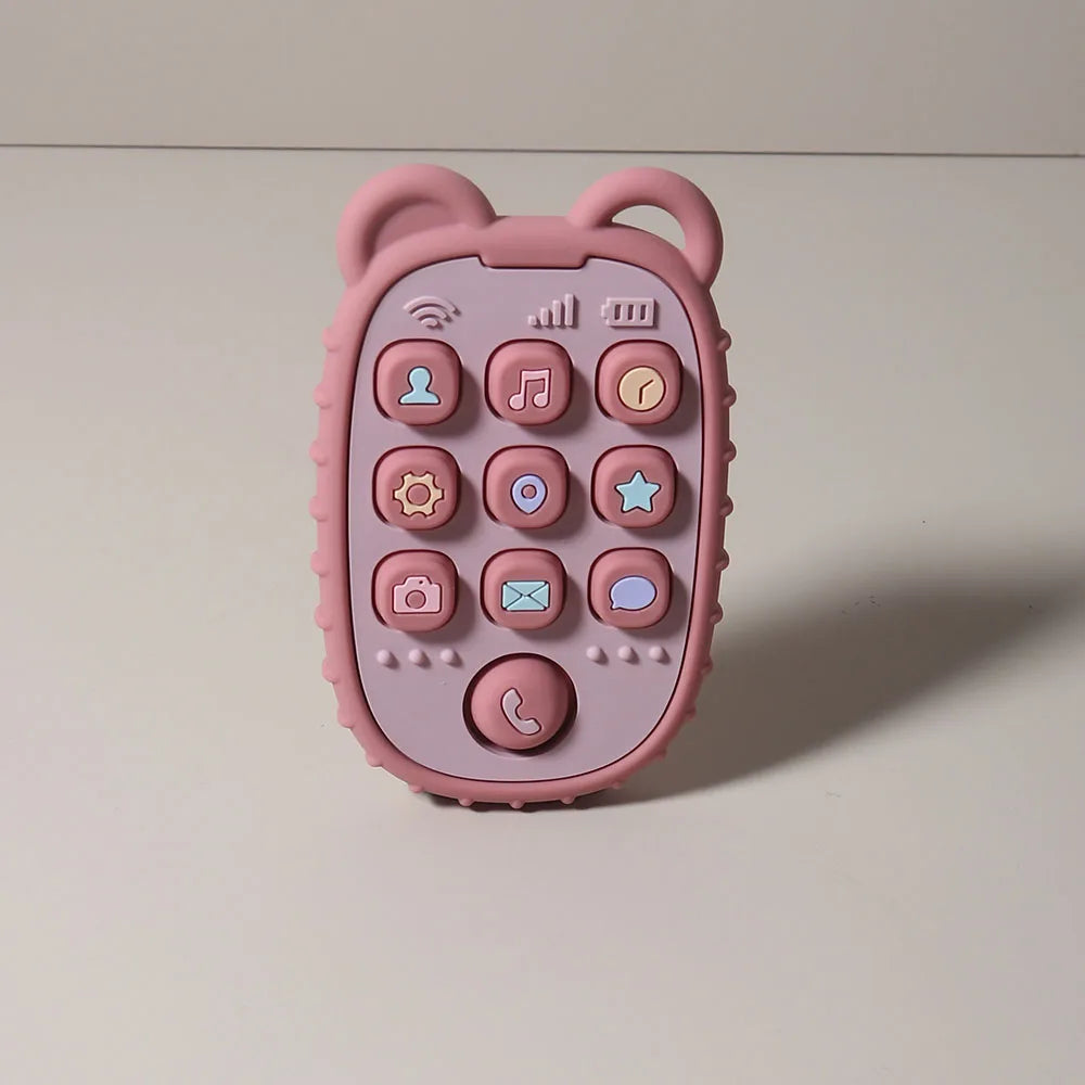 A pink phone-shaped silicone teether with various buttons and icons for babies.