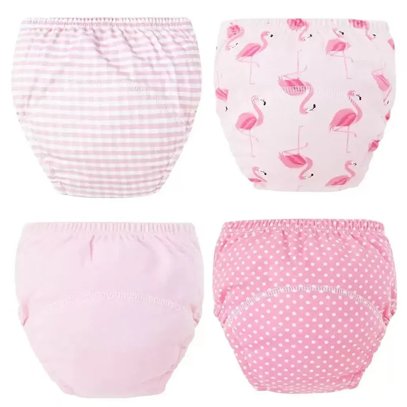 A set of pink reusable cotton potty training pants for toddlers featuring various patterns including stripes, flamingos, and 