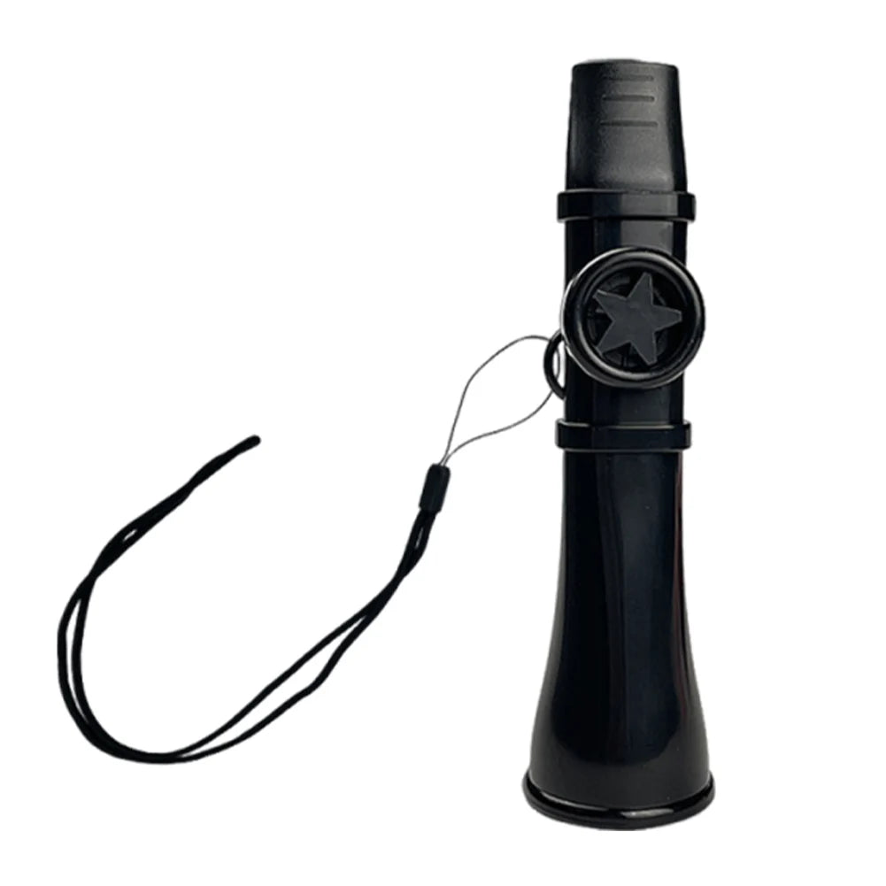 A black portable kazoo flute with a lanyard attached, shown vertically.
