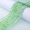 Green faceted glass crystal beads strung together for jewelry making