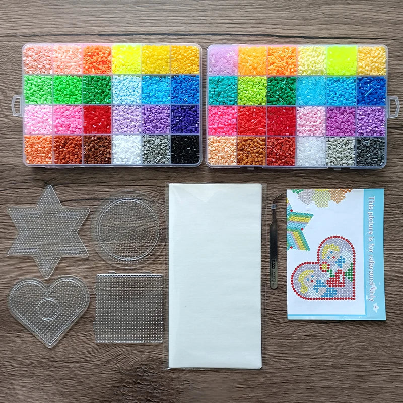 A craft kit showing various colored fuse beads, a star, a circle, a heart, and a square tile.