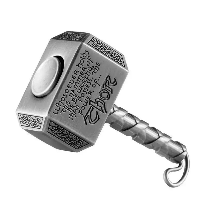 A silver hammer-shaped metal fidget spinner with a transformable design.