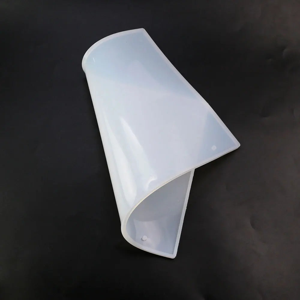 Clear silicone mold for an epoxy resin notebook cover, shaped like a book or folder.