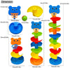 A colorful interactive ball tower featuring rolling balls and a drop mechanism in blue, yellow, and green.