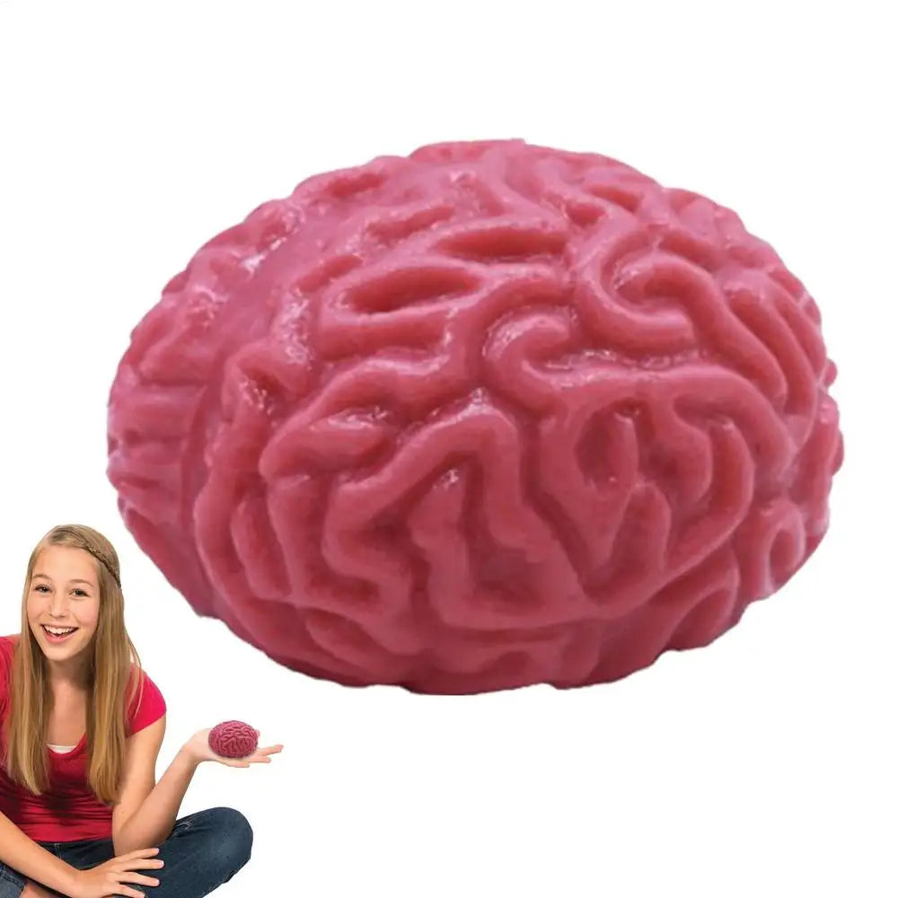 A pink, brain-shaped stress relief ball is held by a young woman.