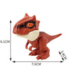 A small, reddish-brown dinosaur finger fidget toy with an open mouth and movable joints.