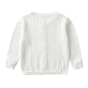 White knitted cotton cardigan sweater for a baby girl