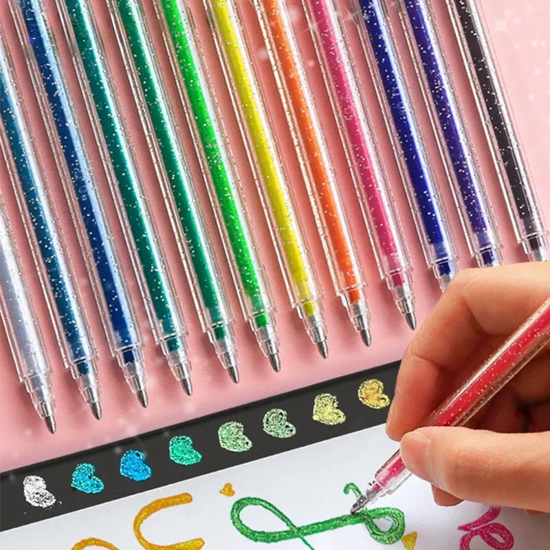 A hand is writing with a colorful glitter gel pen from a set of 1.0 mm pens on a white surface.