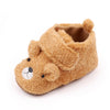 A pair of cute bear design baby prewalker shoes made of soft brown faux fur.
