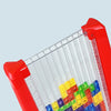 A close-up view of a transparent bulkhead puzzle set with colorful building blocks and measuring lines.