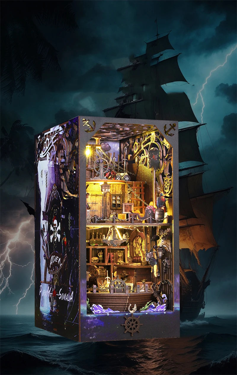 A detailed wooden bookshelf insert model of a pirate ship displayed within a dark, dramatic box against a stormy sea backgrou