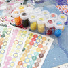 Clear diamond painting bead storage case with numbered bottles and labels filled with various colored beads