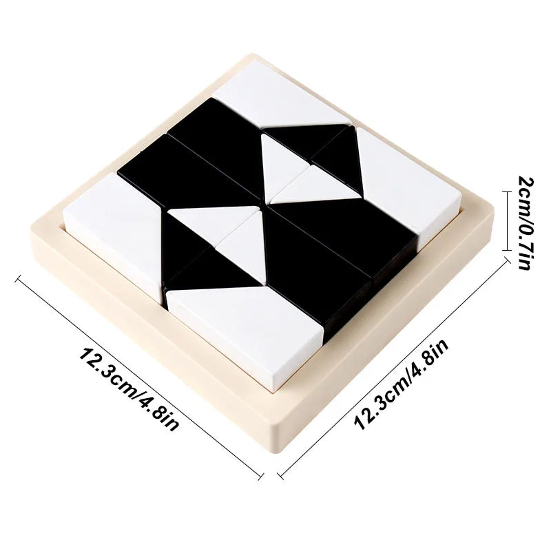 A geometric block puzzle featuring black and white pieces arranged in a square tray.
