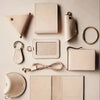 A collection of natural vegetable-tanned cowhide leather sheets and accessories in beige and tan colors.