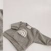 A gray knit long-sleeve top for a baby girl outfit set is displayed on a white background.