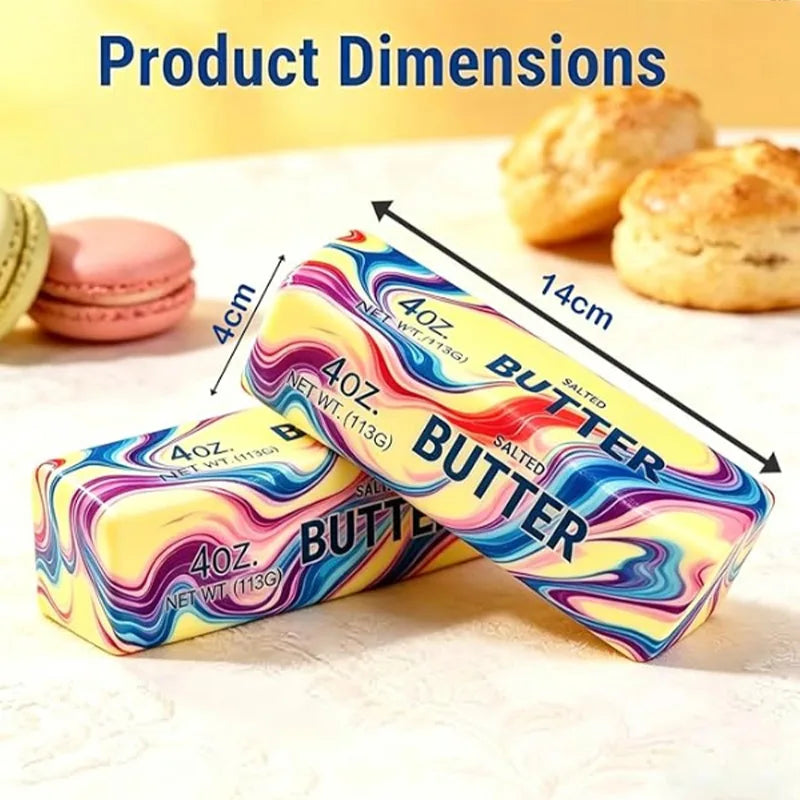 A yellow and purple squishy butter stress relief toy next to a croissant.