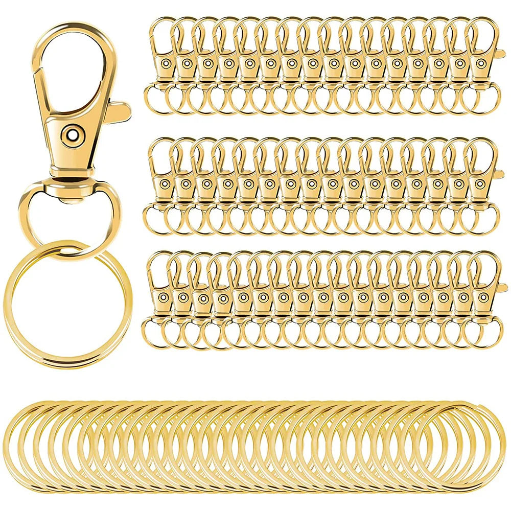A set of premium metal swivel snap hooks and key rings in gold color.