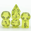 A set of seven translucent yellow dice, including a pyramid die and a d6, are displayed on a white background.