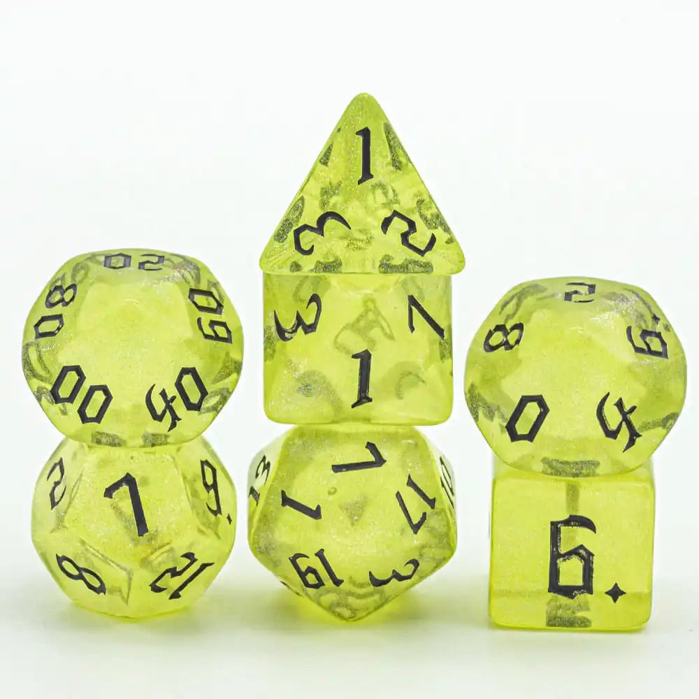 A set of seven translucent yellow dice, including a pyramid die and a d6, are displayed on a white background.
