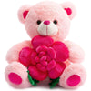 A pink plush bear holding a large, vibrant pink rose.