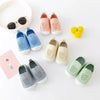A collection of breathable mesh slip-on sneakers for toddlers in various pastel colors and shades.