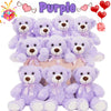 A collection of purple plush teddy bears in various sizes and poses.