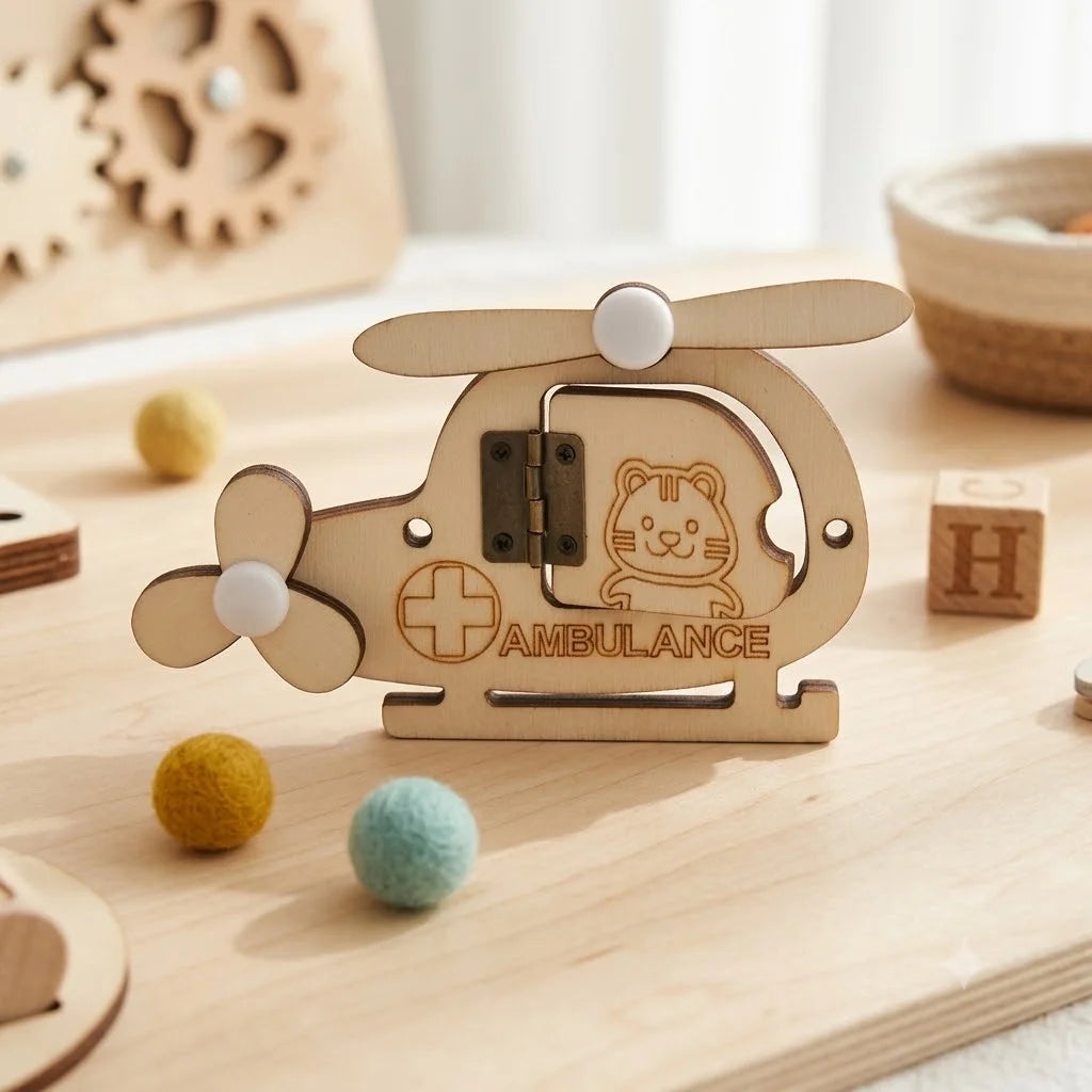A wooden ambulance sensory activity board for toddlers featuring gears and an animal design on a light wood surface.
