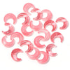 A collection of pink moon-shaped glass beads for DIY jewelry making